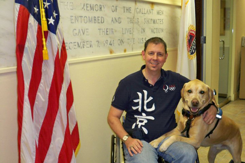 Kevin with his service dog Mambo